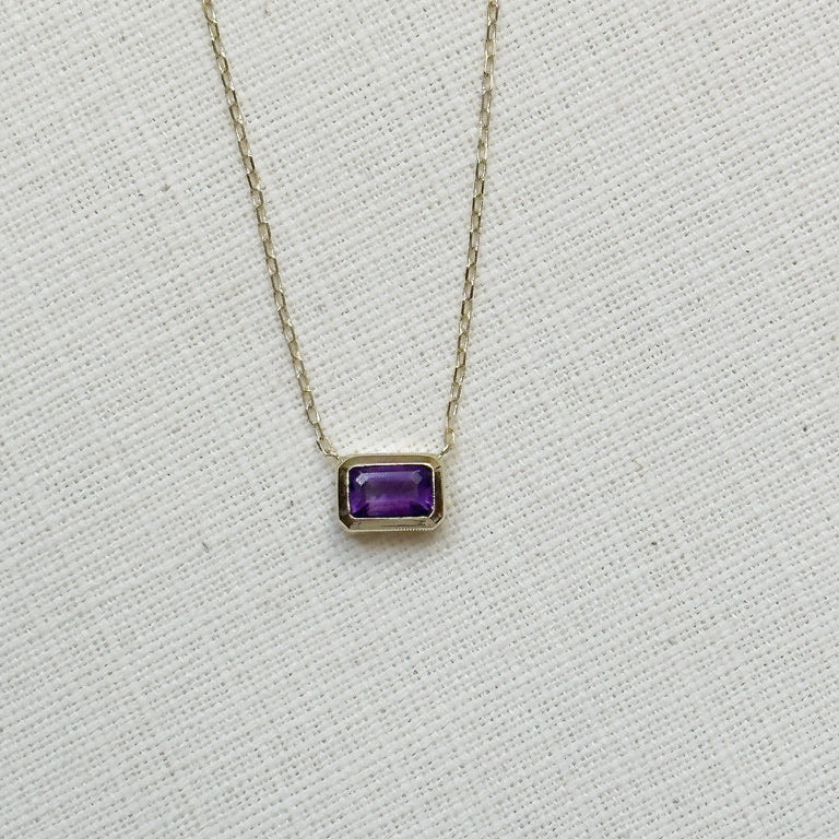 Cadena de oro amarillo 14k con una Amatista