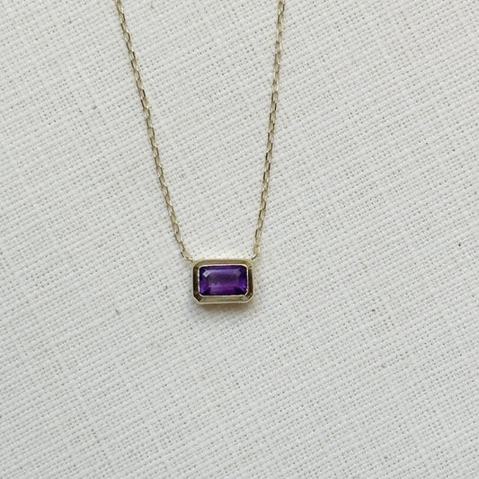 Cadena de oro amarillo 14k con una Amatista