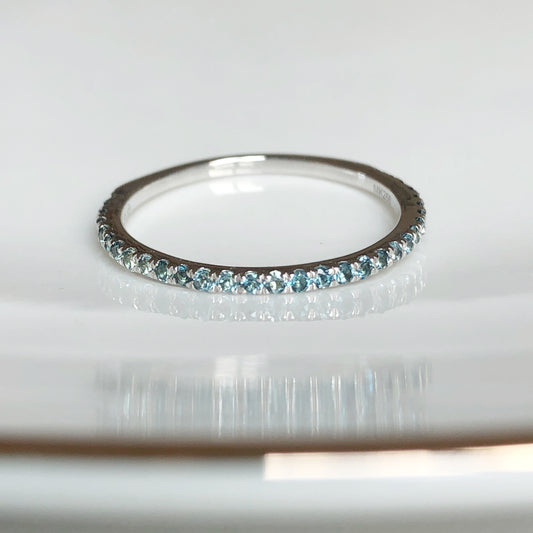 Churumbela de oro blanco 14k y topacios